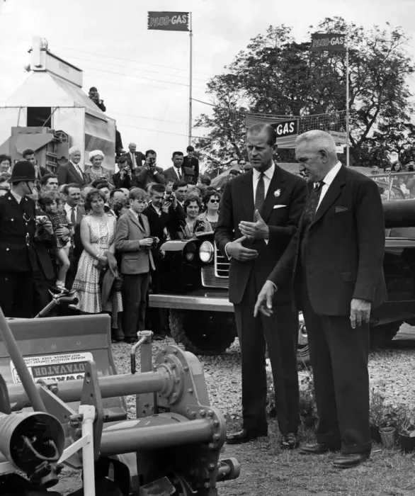 Framed Print : The Duke of Edinburgh showing a vivid interest in farming machinery at the Royal Show