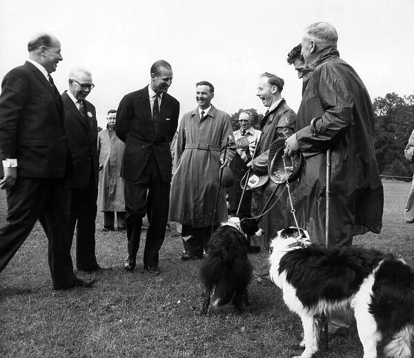 The Duke of Edinburgh talks to some of the Shepherds at the International Sheep Dog
