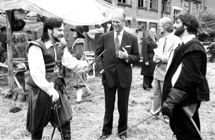 Framed Print : The Duke of Edinburgh visits a film set, chatting to an actors - 17 / 7 / 1987 Framed Print : The Duke of Edinburgh visits a film set, chatting to an actors - 17 / 7 / 1987