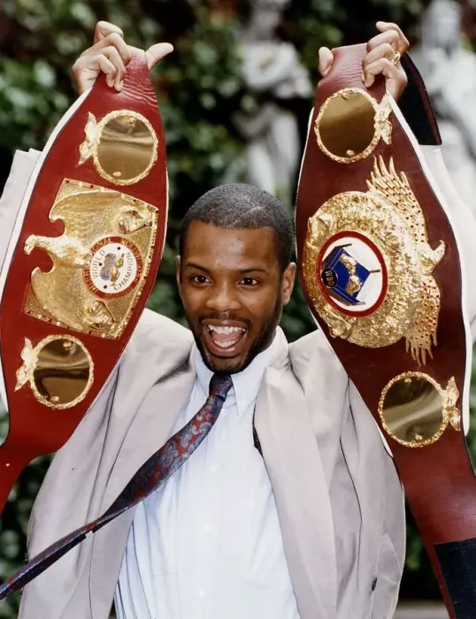 Framed Print : Duke McKenzie Boxing with World Champion Belt right and IBF World Champion Belt left