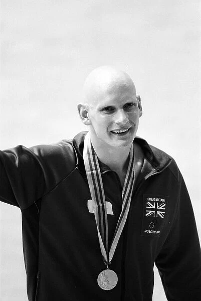 Duncan Goodhew swimmer takes part in medal ceremony after winning gold medal in Men