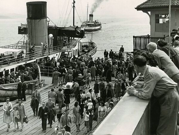 Dunoon Pier, July 1957 Clyde Paddle steamer disgorges passengers Doon The Watter