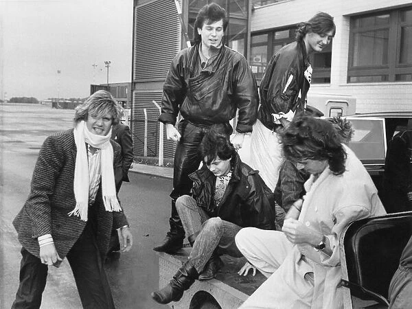 Duran Duran hitch a ride on a baggage trolley when they arrived at Newcasle Airport