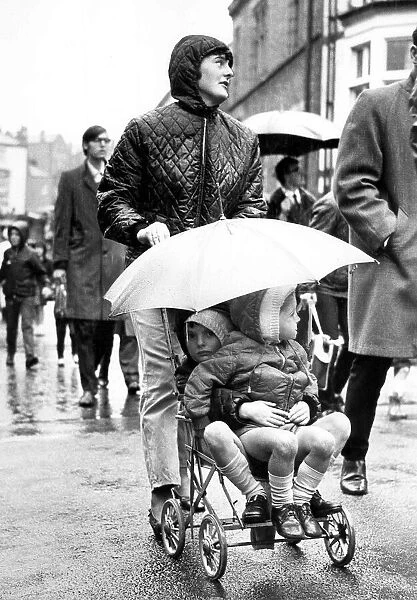 Durham Miners Gala - The heavens may have opened, but these two young gala spectators are
