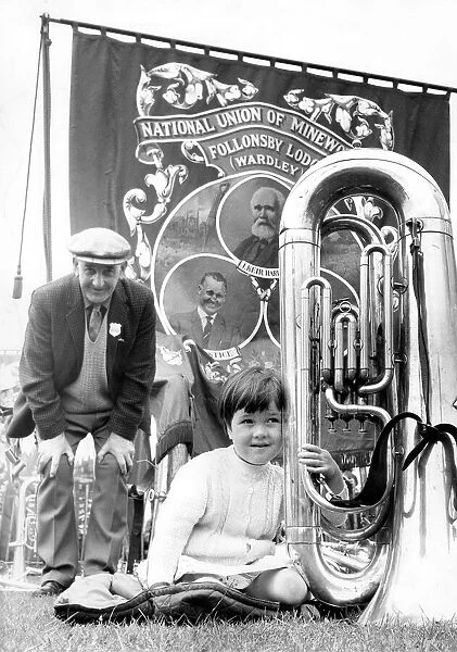 Durham Miners Gala - Saving her breath after marching with the band is 3-year-old Deborah