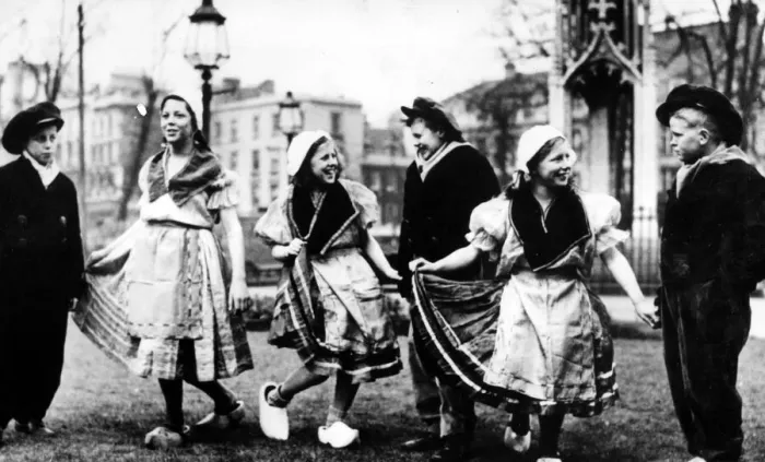 Framed Print : Dutch children dancing on College Green in traditional dress in the mid 1940 Framed Print : Dutch children dancing on College Green in traditional dress in the mid 1940