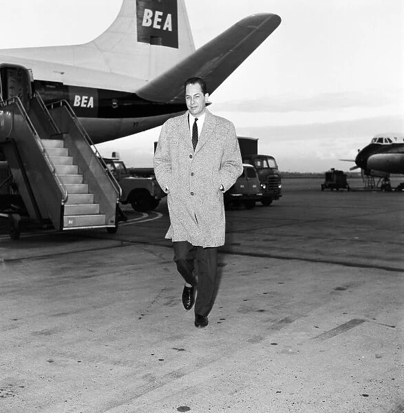 Dutch magician Fred Kaps arriving at Heathrow Airport before his appearance before forty