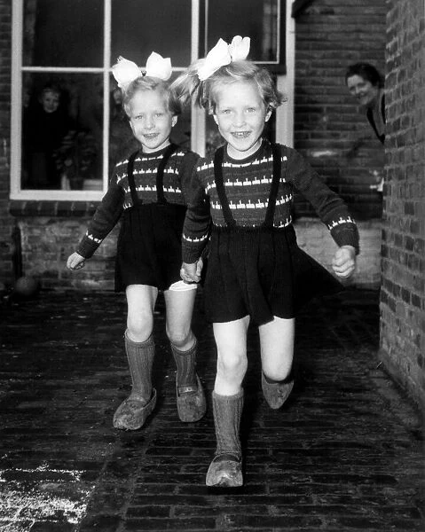 Dutch Siamese twins, successfully separated, hoping to meet the Queen on her visit to