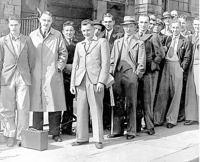 : Duty calls - these young men answered the call to arms as they queued outside Maple : Duty calls - these young men answered the call to arms as they queued outside Maple