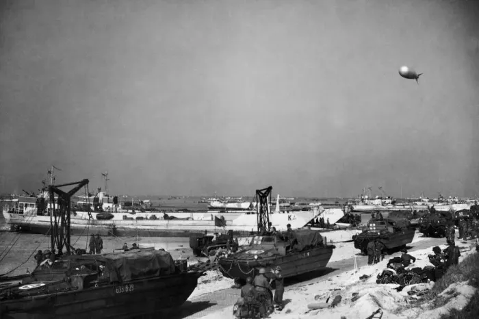 Framed Print : DUWKS lined up on the beach after discharging their loads. 9th June 1944 Framed Print : DUWKS lined up on the beach after discharging their loads. 9th June 1944