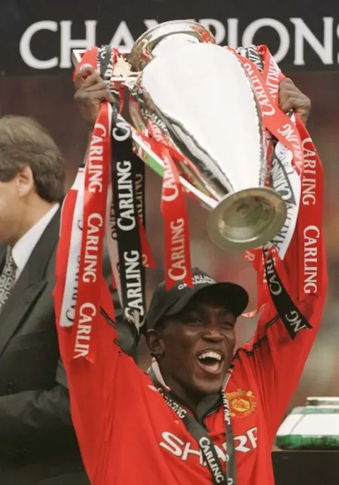 Framed Print : Dwight Yorke celebrates May 1999 after Manchester United winning 2-1 against Framed Print : Dwight Yorke celebrates May 1999 after Manchester United winning 2-1 against