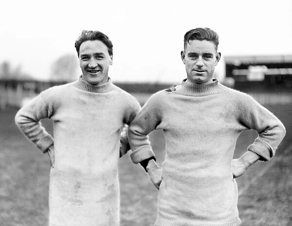 Dynamic wing-half Bob Wallace (left) and reserve centre-forward Duncan Walker smile