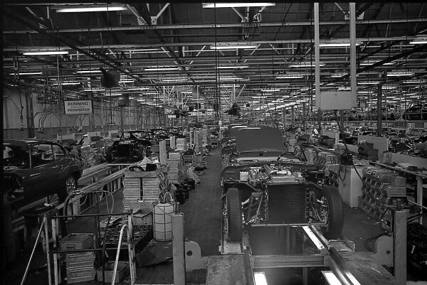The E-type Jaguar car assembly line at the Browns Lane factory