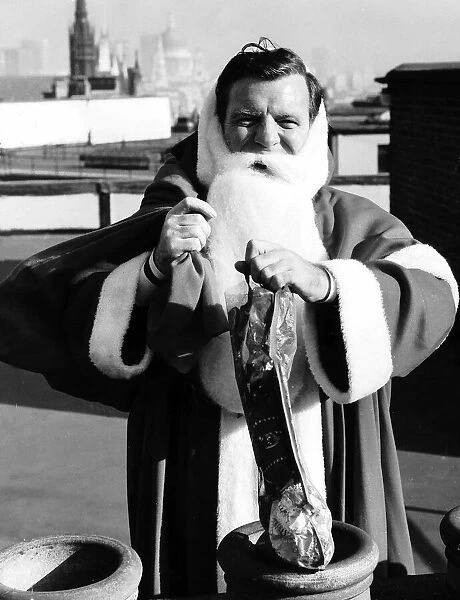 Eamonn Andrews Actor dressed as father Christmas October 1968 to promote