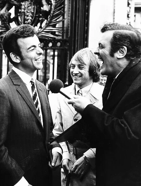 Eamonn Andrews TV presenter of This Is Your Life with golf player Tony Jacklin outside