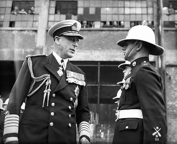 Earl Mountbatten, Admiral of the Fleet, inspects the Guard of Honour from HMS Lion during