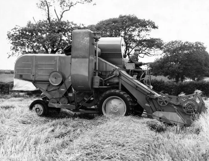 Framed Print : A very early combine harvester Circa 1960