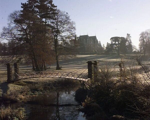 The early morning frost covers the bridge and grounds of Chateau Impney Hotel, Droitwich