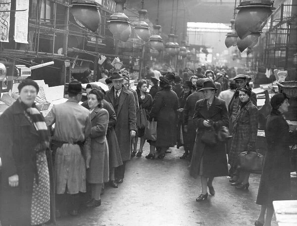 Early morning the scene in the Retail Fish Market as housewives rush for Manchester