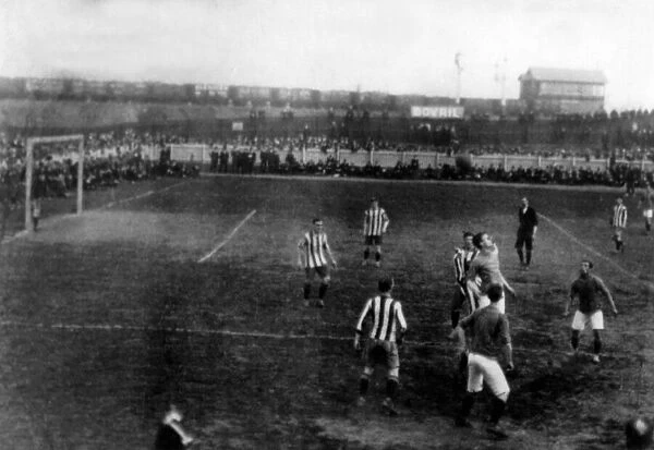 An early picture of Ninian Park taken from Sloper Road with the popular bank