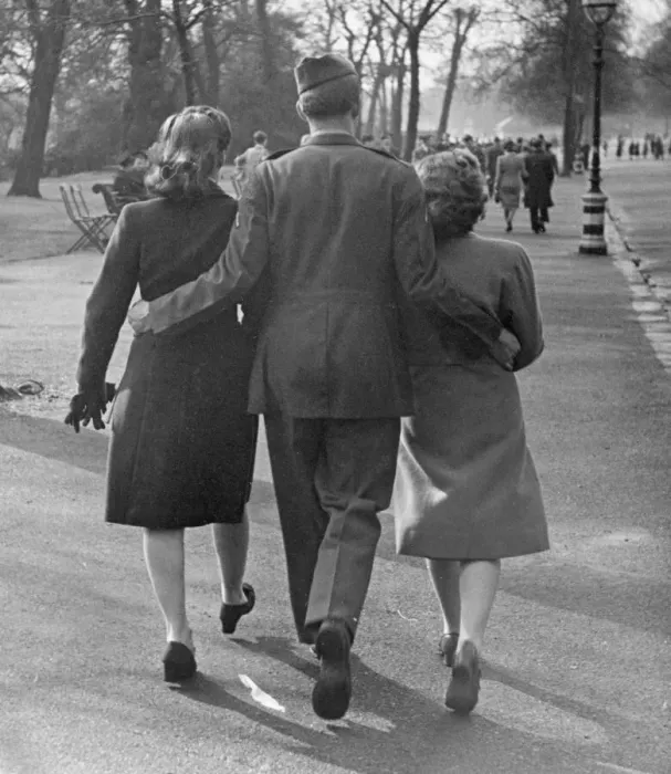 Framed Print : Easter Parade in Hyde Park, April 9th 1944. OPS A soldier with a woman on each arm Framed Print : Easter Parade in Hyde Park, April 9th 1944. OPS A soldier with a woman on each arm