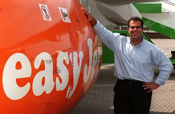Easyjet owner Stelios Haji-Loannou standing beside an aeroplane October 1997