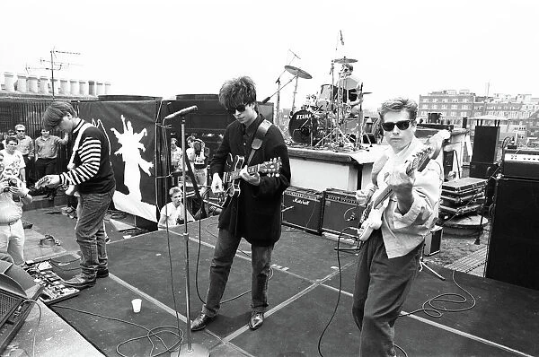 Echo and the Bunnymen rock group playing on London rooftops. 6th July 1987