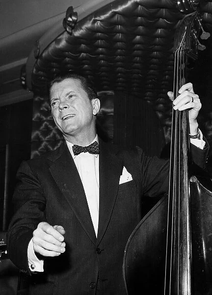 Eddie Condon Jazz musician with double bass 1957