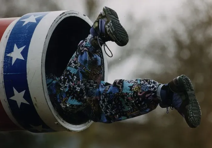 Framed Print : Eddie Edwards Ski-Jump superflop climbs into a cannon head first