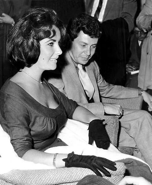 Eddie Fisher With Wife Elizabeth Taylor Actress At London Airport Where They Are Being