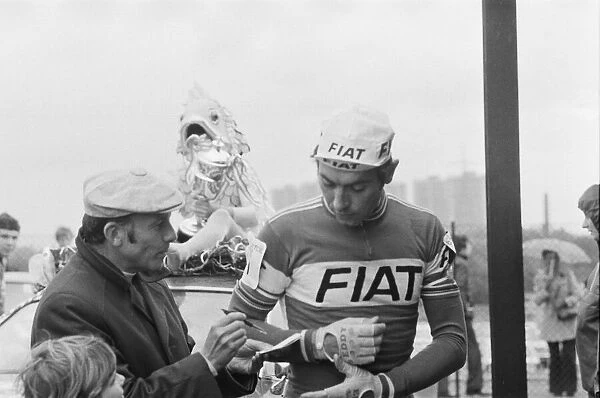 Eddy Merckx is asked to sign his autograph for a fan, as he attends Britains biggest
