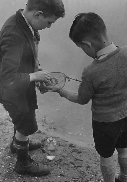EDgbaston Reservoir, two boys fishing. May 1937