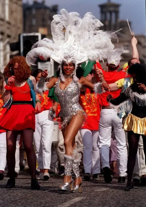 Framed Print : Edinburgh festival aug 1998 edinburgh festival parade a samba dancer dances in