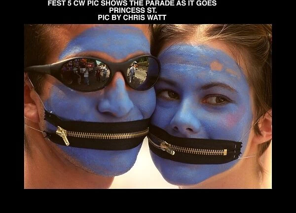 Edinburgh Festival Parade painted blue faces August 1997 With zip fasteners for mouths