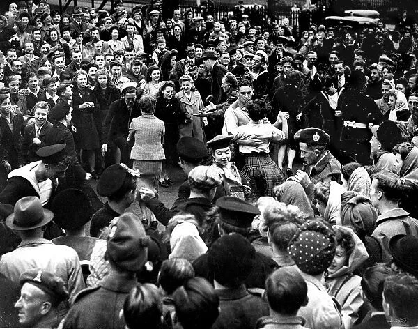 Edinburgh VJ Day August 1945 Celebrating people dance in the streets Victory Japan