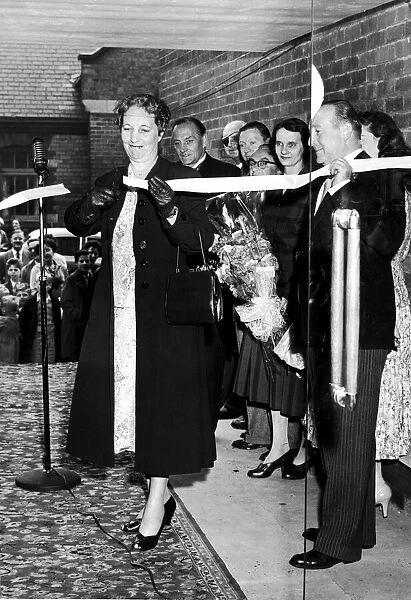 Edith Pitt, Conservative MP attending an opening event and cutting the ribbon