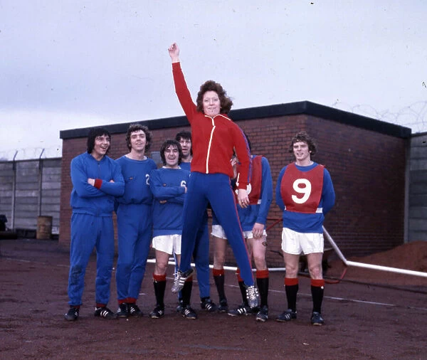 Edna Neillis sport football women 1975 jumping with Rangers players in