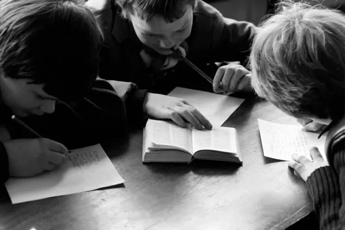 Framed Print : Education: Lack of text books in the early 1980s led to school children having to
