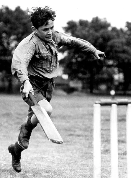 Edward Bolton runs for the crease. 8th July 1946