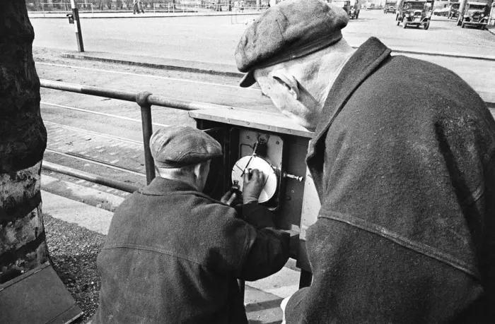 Framed Print : Edward Farmer and assistant seen here checking a sewage flow meter on the embankment