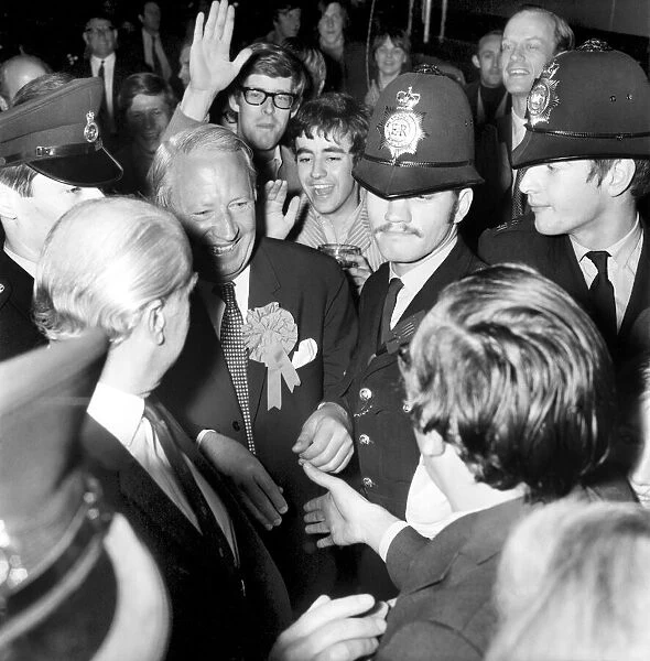 Edward Heath arrives at Tory H. Q. in Smith Square to the cheers of his supporters