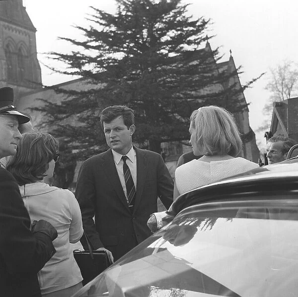 Edward Kennedy departs from Edenson church after paying respects at the grave of his