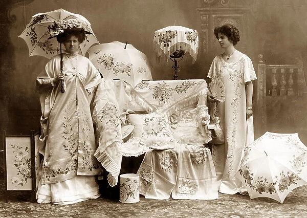 Edwardian mannequins model hand painted silk gowns at the Daily Mirror Fair of Fashion