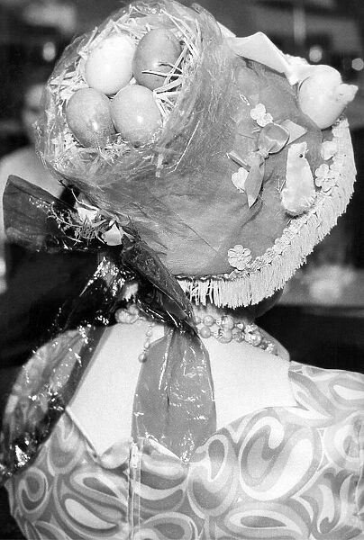 Some eggs precariously perched on top of an Easter bonnet in 1981