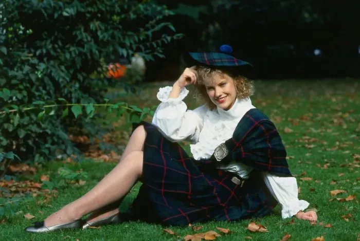 Framed Print : Elaine Smith actress sitting on grass wearing kilt and hat Framed Print : Elaine Smith actress sitting on grass wearing kilt and hat
