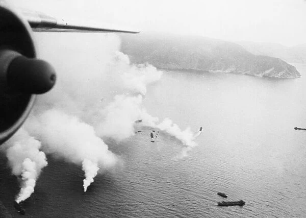 Elba occupied by Allies. (Picture) Allied landing craft approaching the island of