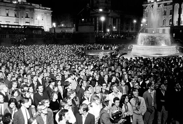 Election night scene in Trafalgar Square as people watch Ted Heath
