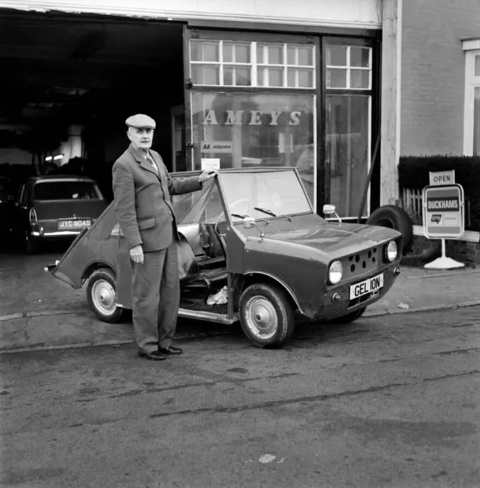 Framed Print : Electric Car  /  Hybrid Car: New car invention. Mr. John de Grunchy