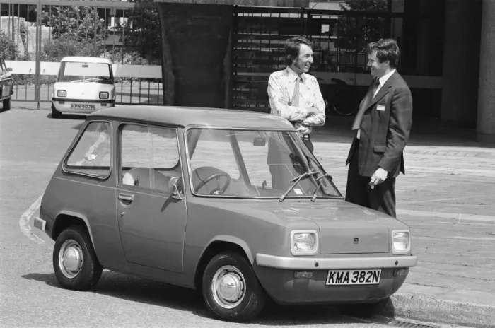 Framed Print : The Electric Car. A new unusually quiet little motor car can be seen going