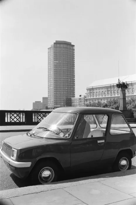 Framed Print : The Electric Car. A new unusually quiet little motor car can be seen going